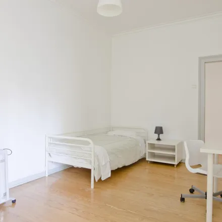 Rent this 6 bed room on Avenida Miguel Bombarda in 1050-167 Lisbon, Portugal