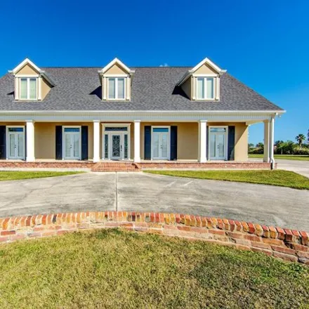 Buy this 4 bed house on N Service Road in Lafourche Parish, LA 70394