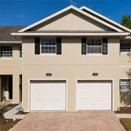 Buy this 3 bed townhouse on 10650 Regent Square Drive in Orange County, FL 32825