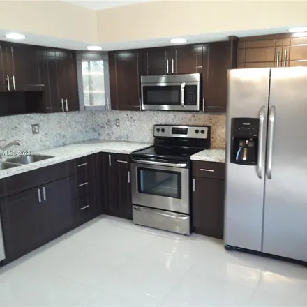 Rent this 3 bed apartment on 8700 Southwest 133rd Avenue Road in Miami-Dade County, FL 33183