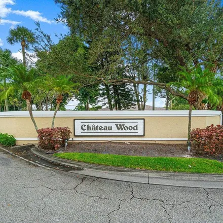 Rent this 3 bed apartment on 4239 Village Drive in Kingsland, Delray Beach