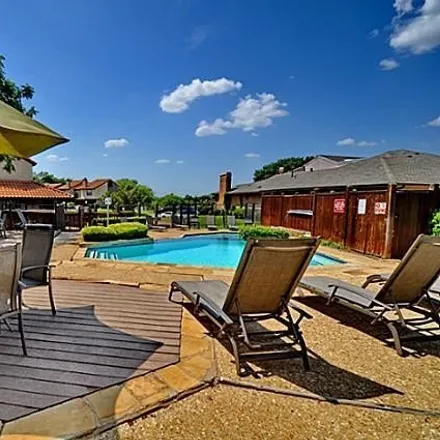 Rent this 2 bed condo on 2699 Lakehill Lane in Carrollton, TX 75006