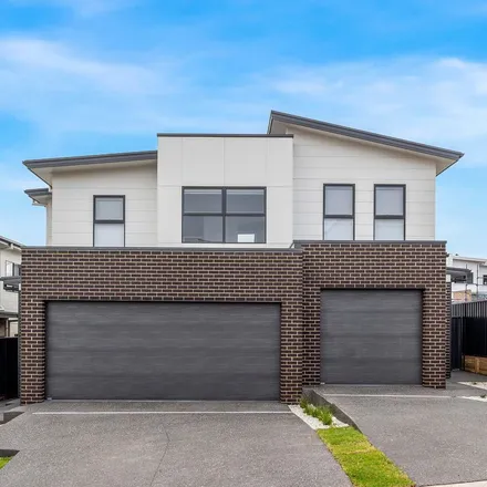 Rent this 3 bed duplex on Galactic Drive in Dunmore NSW 2529, Australia