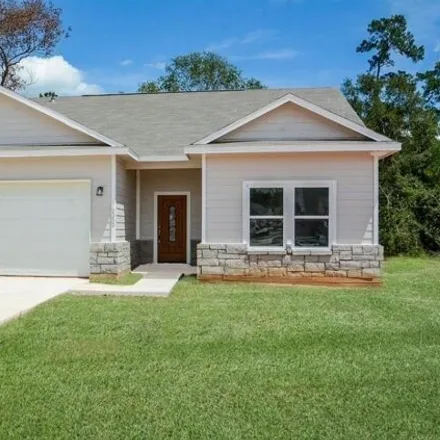 Rent this 3 bed house on Cedar Place Drive in Montgomery County, TX
