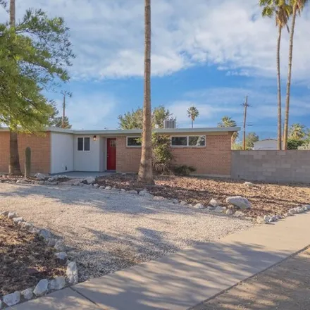 Buy this 3 bed house on 902 South Sherwood Village Drive in Tucson, AZ 85710