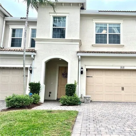 Buy this 3 bed townhouse on 917 Banyan Drive in Hollywood, FL 33021
