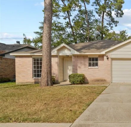 Rent this 3 bed house on 22910 Pebworth Pl in Spring, Texas