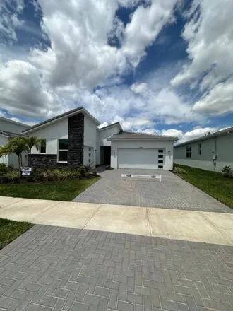 Rent this 2 bed house on Southwest Viridian Boulevard in Port Saint Lucie, FL 34853