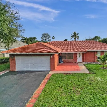 Buy this 4 bed house on 12128 Northwest 33rd Street in Coral Springs, FL 33065