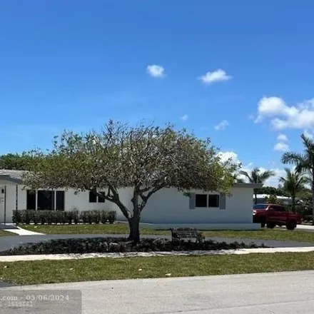 Rent this 4 bed house on 304 Northeast 24th Street in Harbor East, Boca Raton