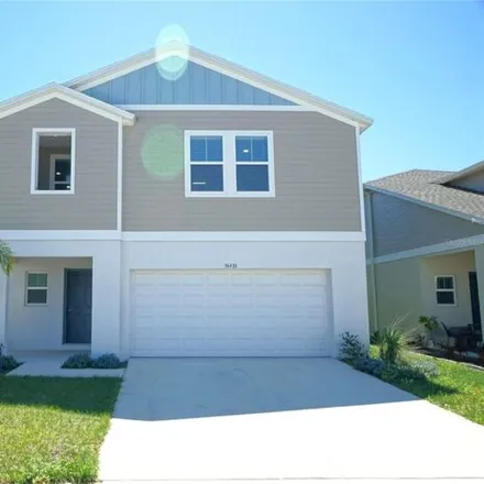 Rent this 4 bed house on Moonflower Avenue in Pasco County, FL 33526