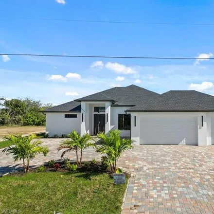 Buy this 3 bed house on 1199 Northeast 13th Place in Cape Coral, FL 33909