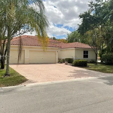 Buy this 4 bed house on 4998 Northwest 53rd Avenue in Coconut Creek, FL 33073