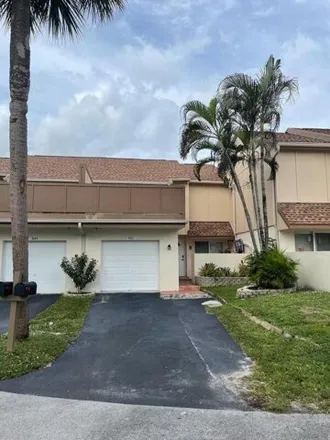 Rent this 3 bed townhouse on Northwest 80th Way in Plantation, FL 33324