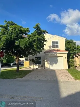 Rent this 3 bed house on 3346 Chickee Ln in Margate, Florida