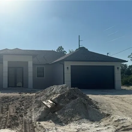 Buy this 3 bed house on 70 Xelda Avenue South in Lehigh Acres, FL 33976
