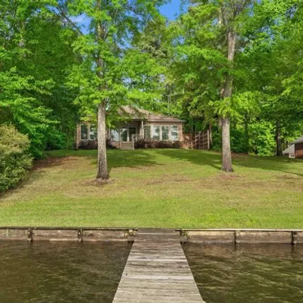Rent this 3 bed house on 2304 West Lake Drive in Phillips, Gladewater