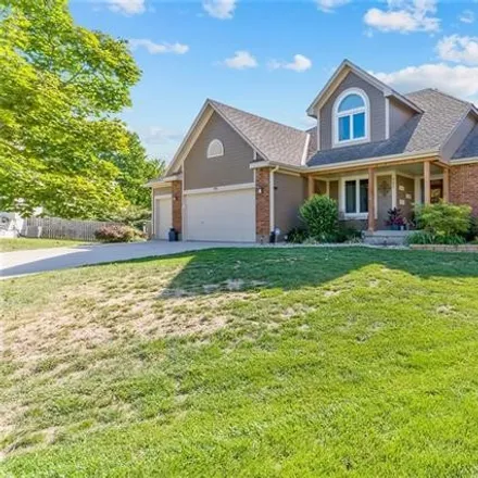 Buy this 5 bed house on 701 Shore Vista Court in Raymore, MO 64083