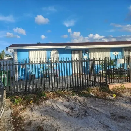 Rent this 2 bed house on 3121 Northwest 103rd Street in Miami-Dade County, FL 33147