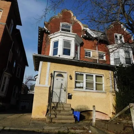 Buy this 6 bed house on 5035 Cedar Avenue in Philadelphia, PA 19143