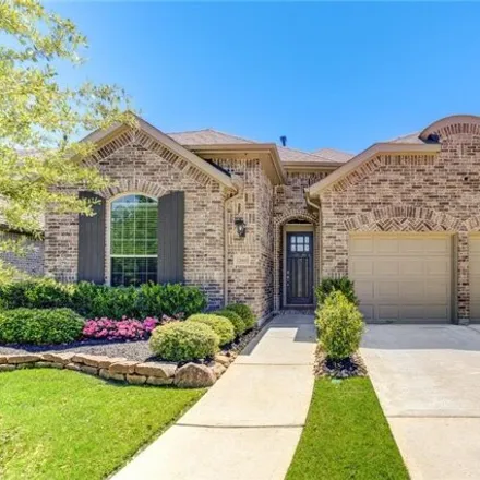Buy this 4 bed house on 12606 Woodburn Forest Drive in Harris County, TX 77346