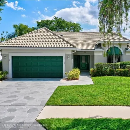 Buy this 3 bed house on 3600 Northwest 71st Street in Coconut Creek, FL 33073