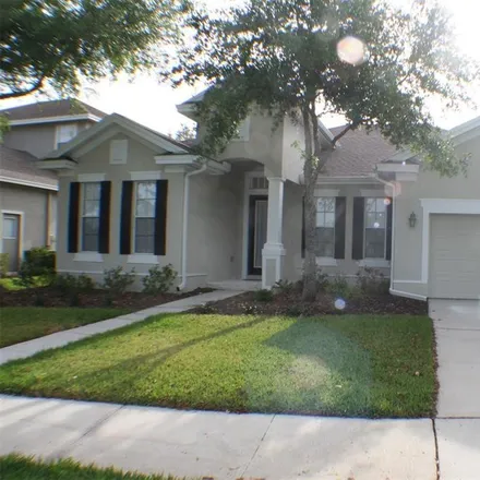 Rent this 4 bed house on 8940 Westerland Drive in Pasco County, FL 34637