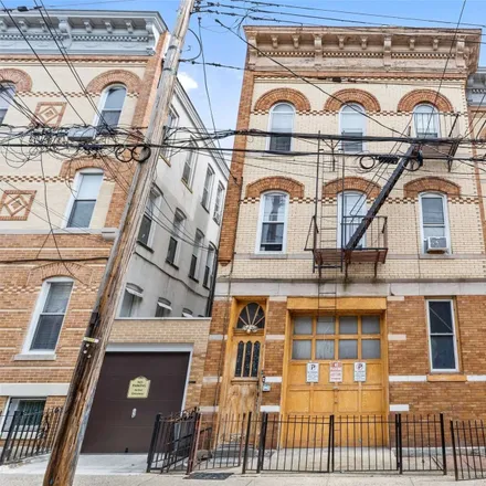 Buy this 3 bed townhouse on 60-01 Palmetto Street in New York, NY 11385