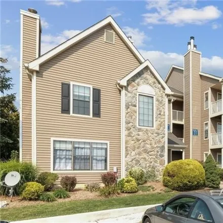 Rent this 2 bed townhouse on 399 Crosspointe Drive in Washington Heights, East Brunswick Township