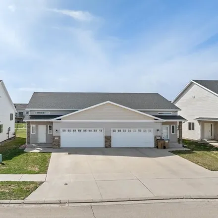 Buy this 3 bed townhouse on 1 10th Street Northeast in Ward County, ND 58703