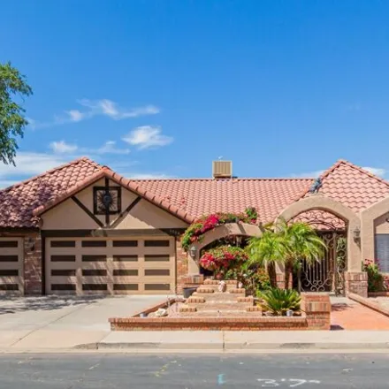 Buy this 4 bed house on 1114 West Meseto Avenue in Mesa, AZ 85210