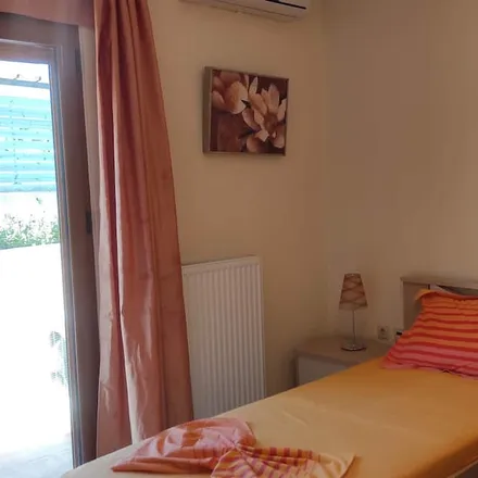 Rent this 3 bed house on Ag. Dimitrios in Πηγής - Λουτρών, Pigi