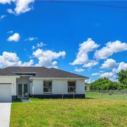 Buy this 3 bed house on 2875 2nd Street Southwest in Lehigh Acres, FL 33976