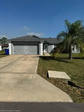 Rent this 4 bed house on 4000 Loretto Avenue in Highlands County, FL 33872