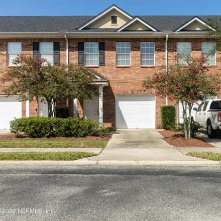 Buy this 3 bed townhouse on Landau Road in Jacksonville, FL 32260