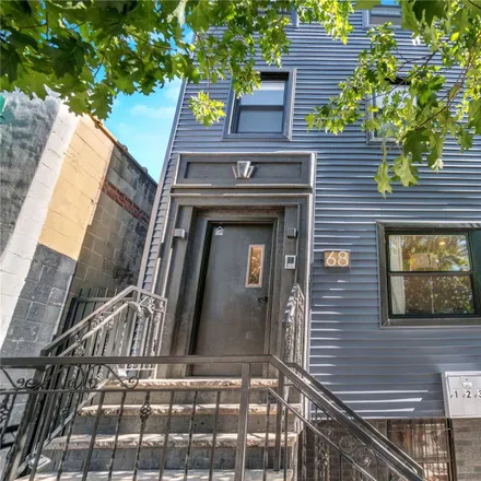 Buy this 7 bed townhouse on 68 Eckford Street in New York, NY 11222
