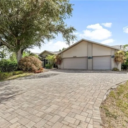 Buy this 4 bed house on 204 SE 20th Pl in Cape Coral, Florida