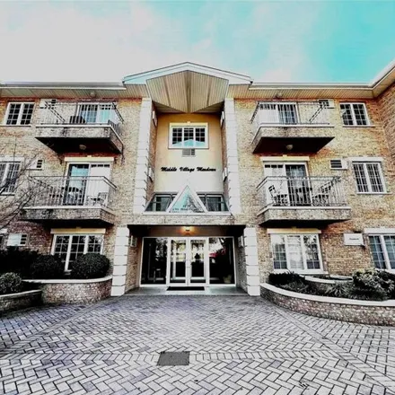 Image 2 - 62-46 Mount Olivet Crescent, New York, NY 11379, USA - Condo for sale