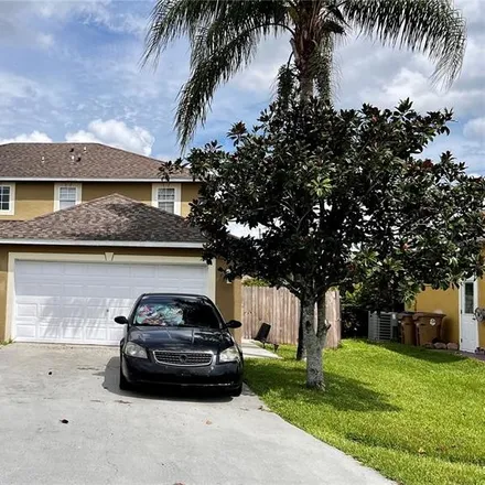 Buy this 4 bed house on 302 Alegriano Court in Poinciana, FL 34758