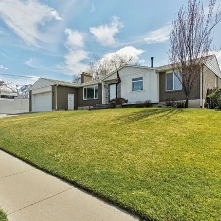Buy this 4 bed house on 1938 7130 South in Cottonwood Heights, UT 84121