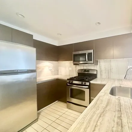 Rent this 3 bed apartment on 347 E 65th St