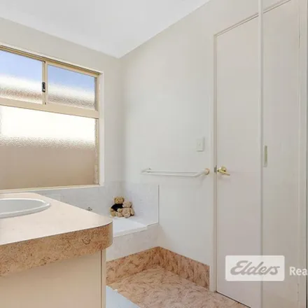 Rent this 3 bed townhouse on Shoalhaven Place in Waikiki WA 6169, Australia