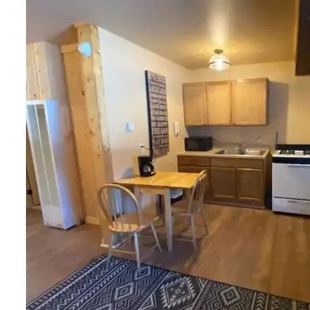 Rent this 1 bed condo on Red River