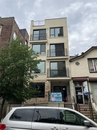 Buy this 8 bed townhouse on 147-07 88th Avenue in New York, NY 11435