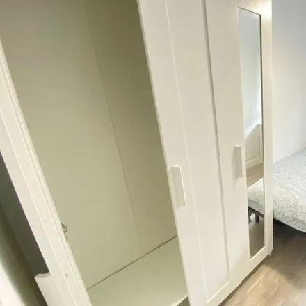 Rent this 4 bed room on Calle de Encarnación Oviol in 28021 Madrid, Spain