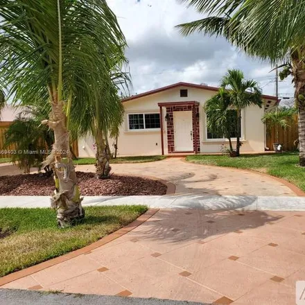Rent this 3 bed house on 6863 SW 21st St