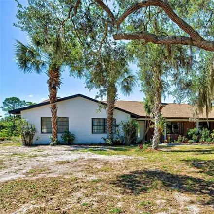 Buy this 3 bed house on 1061 Owl Dr in Englewood, Florida