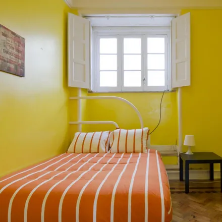 Rent this 6 bed room on Guest In Ninho in Rua Damasceno Monteiro 91, 1170-221 Lisbon