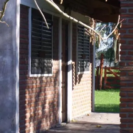 Buy this 1 bed house on Calle 12 in Villa Parque Sicardi, 1909 Buenos Aires