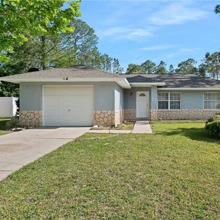 Buy this 2 bed house on 49 Regency Drive in Palm Coast, FL 32164